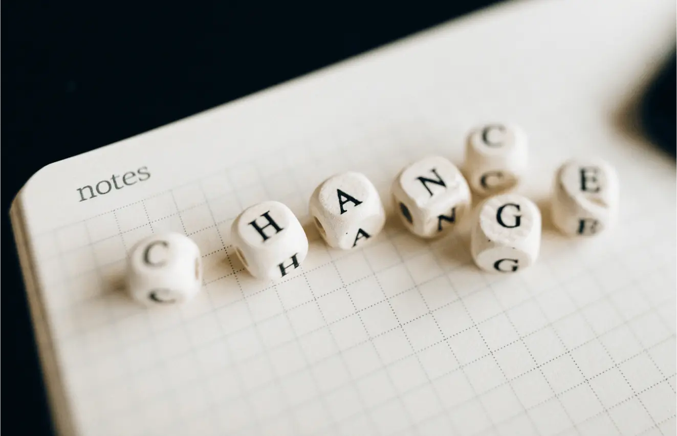 Schriftzug Change auf Würfeln dargestellt